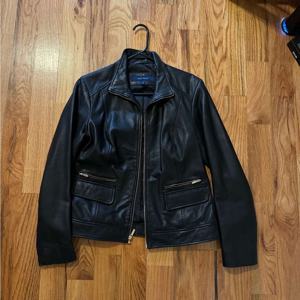 Cole Haan leather jacket women’s. Size medium. Never worn.